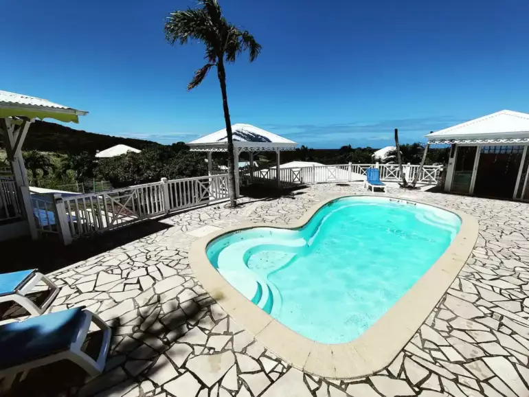 Location vue sur mer “Villa L’Effet Mer” avec piscine  à Sainte-Rose, Guadeloupe pour 10 personnes à partir de 160 €/nuit