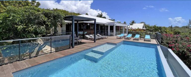 Location Villa de luxe “Tropicale”  pour 10 personnes à Saint-François, Guadeloupe avec vue sur mer à partir de 368€/nuit